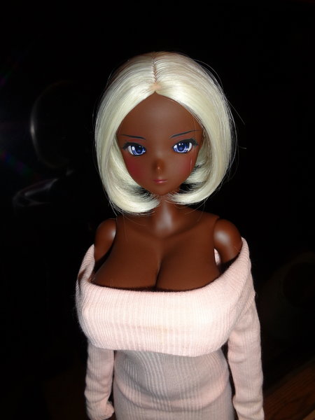 Emma trying on a pink dress