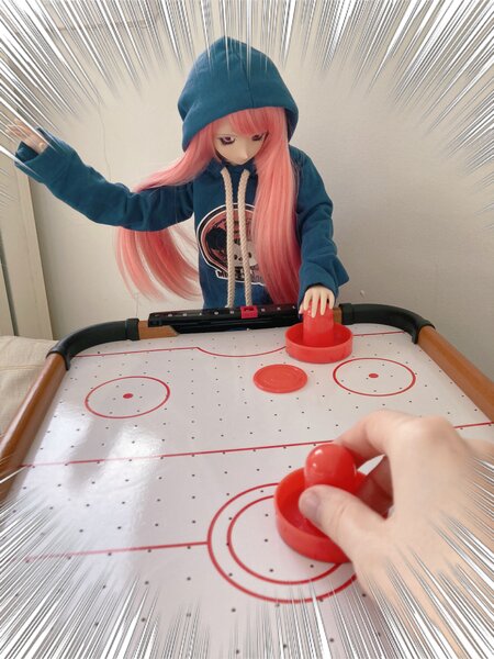 Clover played air hockey! She won
